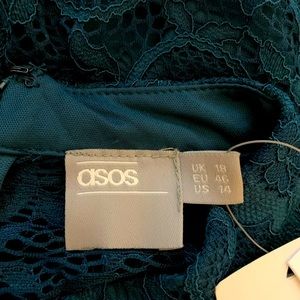 Green lace jumpsuit. NWT.